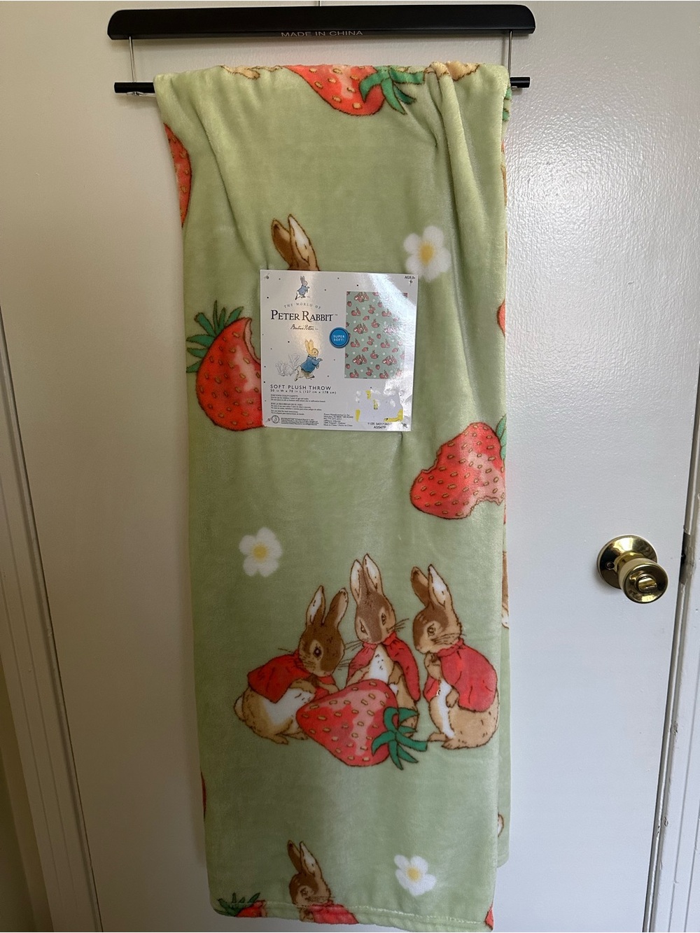 Source Unknown Light Green Peter Rabbit Fleece Throw with Strawberry Print